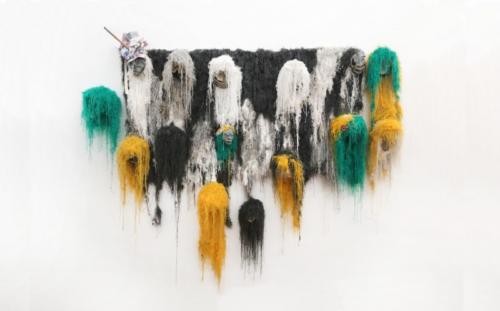 Brain and brain toughts differ by Terence Musekiwa, 2018. Spring stone, silk, wood, wire and banknotes.