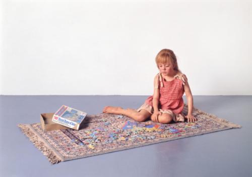 Child with Puzzle by Duane Hanson, 1978. Polyvinyl, polychromed in oil, mixed media with accesories