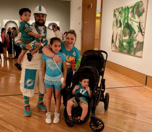 Dolphins family fan