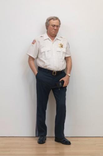 Security Guard by Duane Hanson, 1990. Autobody filler polychromed in iol, mixed media, and accessories, 71x26x13