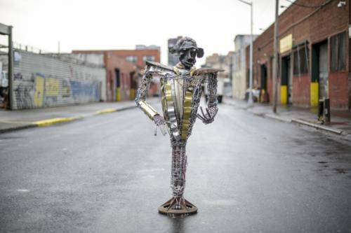 Wisdom Giver, by Terence Musekiwa, 2018. Spring stone, metals, galvanized wire, plastic and found object. 52 x 45 x 14 in