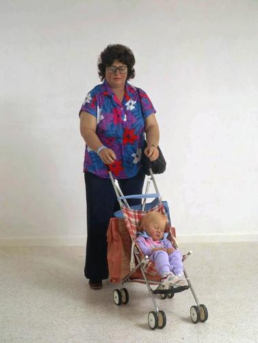 Woman with Child in a Stroller by Duane Hanson, 1985. Autobody filler, polyvinyl and mixed media with accessories. Life Size.